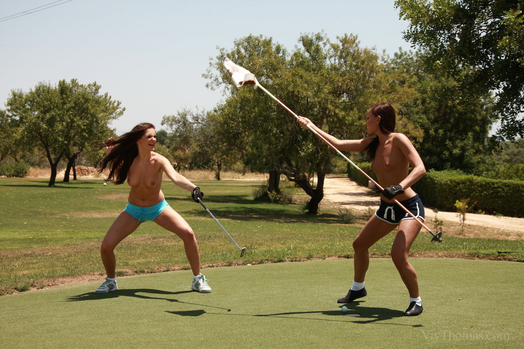 JO and Sandra Shine having topless fun under the sun, carefree and happy while taking turns putting in the golf course.